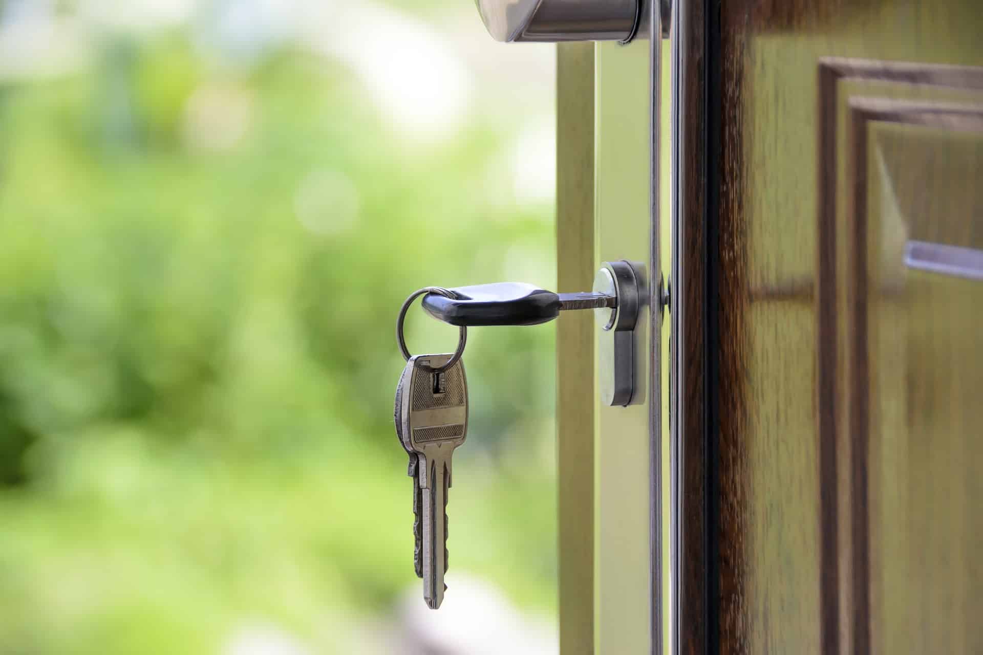 An image of a key in a door